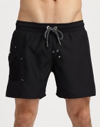 Classic swim trunk style, in a rich solid, finished with side pocket and signature logo detail.Drawstring elastic waistFully linedInseam, about 7PolyesterMachine washImported