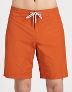 Engineered board shorts, perfect for traipsing the streets or surfing the waves, set in quick drying cotton-nylon.Drawstring waistZip flyBack welt pocketsInseam, about 855% cotton/45% nylonMachine washImported