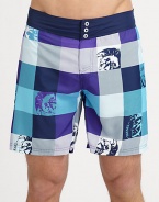 Bold, colorful plaid swim trunks with graphic detail in quick-drying nylon.Elastic waistBack flap pocketInseam, about 7PolyesterMachine washImported