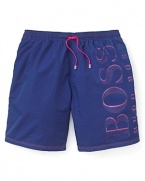 Catch the wave with an exciting contrast of colors on this fun-in-the-sun pair of swim trunks from BOSS Black.