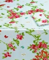 Butterflies and birds flit about branches of pink and red on the aptly named Spring Blossom tablecloth, inspired by the work of artist Vera Neumann. Go all out with patterned napkins and placemats to match.