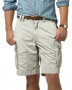 Plain front, relaxed fitting chino cargo shorts. Tightly woven cotton for style and durability. Soft washed for lived-in character and softness. Quarter top pockets and side cargo flap pockets offer cool, classic appearance. Relaxed, comfortable style. Pocket flaps feature taping detail. 8 inseam.