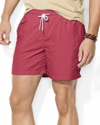 The classic-fitting Traveler swim short is rendered in quick-drying nylon for casual comfort in the sun and sand.
