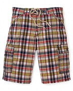 An exciting, colorful plaid pattern brightens everyone's day at the beach with these True Religion Swim cargo board shorts.