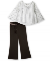 Flared sleeves give this polka dot top from BCX a fluttery flow. Flared sleeves give this polka dot top from BCX a fluttery flow.