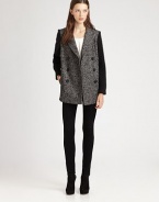 This sophisticated silhouette sports a textural tweed body and cozy knit sleeves