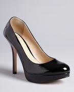 Keep your work wardrobe exciting with these patent leather platform pumps.