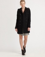 A classic double-breasted silhouette, styled with oversized flap pockets, all in rich blended wool.Notch collarEpaulettesChest pocketsGun flapsButton frontWelt pocketsFlat pocketsInverted back pleatAbout 32 from shoulder to hem70% wool/30% nylonDry cleanImportedModel shown is 5'10 (177cm) wearing US size Small.