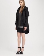 Layered sleeves, asymmetrical zipper and an adjustable back bungee cord add a modern feel to this oversized, lightweight parka with an attached hood. FunnelneckHoodAsymmetrical two-way zipperLong, layered sleevesSingle snap pocketBungee cord at back hemAbout 32 from shoulder to hemPolyesterDry cleanImported of Italian fabricModel shown is 5'10 (177cm) wearing US size Small.