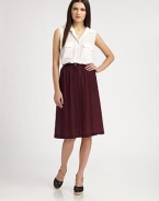 Lengthy silhouette adds a little old-world charm to this pleated silk staple. Button closureBelt loops at waistbandSlash pocketsSide zipperAbout 26 from natural waistSilkDry cleanMade in USA of imported fabricModel shown is 5'10 (177cm) wearing US size 4.
