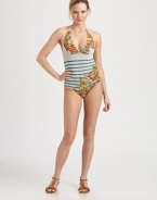 An incomparable combination of stripes and flowers makes this swim style a charming look.Deep v-neckHalter strap ties at neckBack clasp closureCutout detail on backFlattering Empire waist90% polyamide/10% elastaneDry cleanMade in Italy