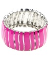 Accessorize with color! A wavy pattern of fuchsia enamel makes Nine West's cuff bracelet one hot number! Set in imitation rhodium-plated mixed metal. Bracelet stretches to fit wrist. Approximate diameter: 2-1/4 inches.