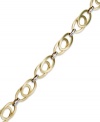 Double the fun. YellOra™'s pretty interlocking link bracelet is crafted from a two-tone combination of pure gold, sterling silver and palladium. Approximate length: 7-1/4 inches.