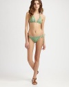 A playful swim design offering a phenomenal fit, thanks to adjustable triangle cups and just the right amount of stretch. Halter strap ties at neckTriangle cupsBack tie closureFully lined80% polyamide/20% elastaneHand washImported of Italian fabric Please note: Bikini bottom sold separately. 