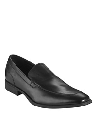 Sleek, full-leather slip on from Cole Haan, with the added comfort and support of Nike Air™ technology in the heel. Sleek, full-leather slip on from Cole Haan, with the added comfort and support of Nike Air™ technology in the heel.