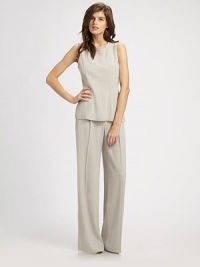 Airy wool blend with a pleated front and voluminous wide-leg construction. Tab closureZip flySlash pocketsInseam, about 3650% virgin wool/50% viscoseDry cleanMade in USA of Italian fabric Airy wool blend with a pleated front and voluminous wide-leg construction. Tab closureZip flySlash pocketsInseam, about 3650% virgin wool/50% viscoseDry cleanMade in USA of Italian fabric