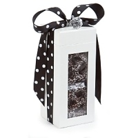 Nicely wrapped in a beautiful box and polka dot black bow, these chocolate-covered confections are a mouthwatering delight - perfect for gift giving.