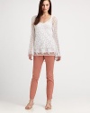 A delicate cotton top featuring intricate lace and a modern, high-low hem.V-neckLong sleevesAllover lacePull-on styleHigh-low hemAbout 28 from shoulder to hemCottonDry cleanImported Model shown is 5'10 (177cm) wearing US size Small. OUR FIT MODEL RECOMMENDS ordering true size. 