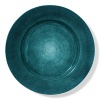 Uniquely crafted to seamlessly join modern design with functionality, this ceramic plate from Mateus is casually chic.