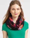 A feminine floral print adds whimsical charm to this scarf made from a luxurious combination of silk and cashmere.About 30 X 74Cashmere/silkDry cleanImported