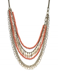 The colors of summer. INC International Concepts' warm-weather style features plastic beads and glass rondelles in vibrant coral hues. Set in mixed metal. Approximate length: 33 inches. Approximate drop: 6 inches. The colors of summer. INC International Concepts' warm-weather style features plastic beads and glass rondelles in vibrant coral hues. Set in mixed metal. Approximate length: 33 inches. Approximate drop: 6 inches.