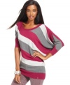 With a slouchy shape and wide stripes, this GUESS sweater is perfectly paired over the season's skinny jeans!