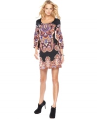 Just in time for fall, INC updates a petite jersey shift with bold colors and an exotic print. Just in time for fall, INC updates a petite jersey shift with bold colors and an exotic print.