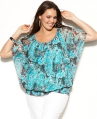 Cheer up your wardrobe for spring with INC's batwing sleeve plus size top, broadcasting a bold print! Cheer up your wardrobe for spring with INC's batwing sleeve plus size top, broadcasting a bold print!