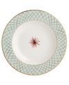 An intricate gold lattice pattern frames a single starburst in the center of this striking rim soup bowl from Bernardaud.