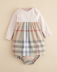 A cute classic rendered in soft jersey cotton, with a woven ruffle skirt printed in Burberry's iconic check design. A cute classic rendered in soft jersey cotton, with a woven ruffle skirt printed in Burberry's iconic check design.