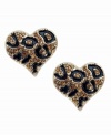 Fall for fierce prints. GUESS earrings feature a wild leopard print design in black enamel and sparkling crystal. Post setting crafted in gold tone mixed metal. Approximate diameter: 1-3/4 inches.