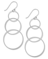 Circular chic. Studio Silver's drop earrings are set in sterling silver and feature circles in elevating sizes for a bit of postmodern appeal. Approximate drop: 2-3/4 inches. Circular chic. Studio Silver's drop earrings are set in sterling silver and feature circles in elevating sizes for a bit of postmodern appeal. Approximate drop: 2-3/4 inches.