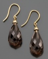 Style with a kick, by Effy Collection. These voluminous drop earrings feature teardrop-shaped smoky quartz (25 ct. t.w.) set in 14k gold. Approximate drop: 1-1/4 inches.