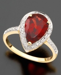 Elegance that suits you. This ring features pear-cut garnet (3-1/3 ct. t.w.) and round-cut diamond (1/10 ct. t.w.) set in 14k gold. Elegance that suits you. This ring features pear-cut garnet (3-1/3 ct. t.w.) and round-cut diamond (1/10 ct. t.w.) set in 14k gold.
