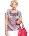 Electrify your neutral bottoms with Style&co.'s short sleeve plus size top, featuring a scarf print.