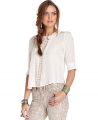 In a cool cropped length, the short hemline adds edge to this otherwise delicately feminine Free People blouse! In a cool cropped length, the short hemline adds edge to this otherwise delicately feminine Free People blouse!