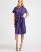 Slip into this crisp shirtdress featuring a waist-defining tie belt, convenient slash pockets and a curve-flattering, pleated skirt.Mandarin collarShort sleevesSelf-tie beltSide zipperSlash pocketsBack yokeAbout 26 from natural waist70% cotton/26% nylon/4% elastaneDry cleanImportedAdditional Information Women's Salon Z Size Guide 