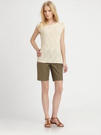 Cable-knit chic, this stretch cotton top features a wavy pattern for an unforgettable look.V-necklineCap sleevesRibbed trimPull-on styleAbout 24 from shoulder to hem66% cotton/34% polyamideHand washImported of Italian fabric Model shown is 5'10 (177cm) wearing US size Small. Cable-knit chic, this stretch cotton top features a wavy pattern for an unforgettable look.V-necklineCap sleevesRibbed trimPull-on styleAbout 24 from shoulder to hem66% cotton/34% polyamideHand washImported of Italian fabric Model shown is 5'10 (177cm) wearing US size Small.