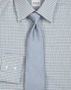 A sartorial standard in a beautifully crafted woven neat silk pattern.SilkDry cleanMade in Italy