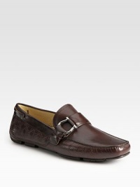 Elegant driver style in fine Italian leather with signature gancini ornament detail.Leather liningPadded insoleRubber soleMade in Italy Elegant driver style in fine Italian leather with signature gancini ornament detail.Leather liningPadded insoleRubber soleMade in Italy