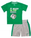 Kick his comfort and sporty style into high gear with this t-shirt and short set from Nike.