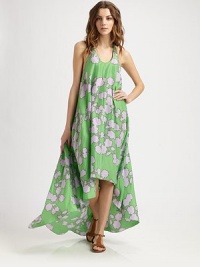 Whimsically designed for a charming look, this coverup features a pretty print, an intriguing back and a flirty high-low hem.ScoopneckSleevelessKeyhole detail on unique racerbackHigh-low hemSilkHand washImportedOUR FIT MODEL RECOMMENDS ordering true size. Whimsically designed for a charming look, this coverup features a pretty print, an intriguing back and a flirty high-low hem.ScoopneckSleevelessKeyhole detail on unique racerbackHigh-low hemSilkHand washImportedOUR FIT MODEL RECOMMENDS ordering true size.