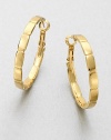 Add interest with this shiny design with 14k goldplating. 14k goldplated brassLength, about 1.25Hinged post backImported 
