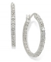 A girl can never have too much sparkle. Victoria Townsend's stunning hoop earrings are set in sterling silver with round-cut diamond accents that truly dazzle. Approximate diameter: 1 inch.