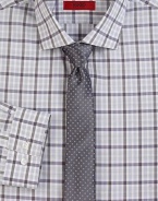 Crisp, clean silhouette, in a handsome check pattern of fine cotton.ButtonfrontPoint collarCottonDry cleanImported