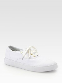 A simple design with understated style, expertly crafted in a lightweight canvas that pairs easily with your laid-back, weekend wardrobe.Canvas upperLeather liningPadded insoleRubber soleImported A simple design with understated style, expertly crafted in a lightweight canvas that pairs easily with your laid-back, weekend wardrobe.Canvas upperLeather liningPadded insoleRubber soleImported
