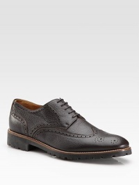 EXCLUSIVELY OURS. The makings of a perfect gentleman, constructed in Italy from pebbled leather with timeless brogue perforations. Leather liningLeather soleMade in Italy EXCLUSIVELY OURS. The makings of a perfect gentleman, constructed in Italy from pebbled leather with timeless brogue perforations. Leather liningLeather soleMade in Italy