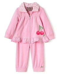 Casual wear gets a feminine kick with a pretty pink cherry print top and bottom set from Juicy. A ruffled hem, contrasting striped collar and shirring details add fashionable flair. Casual wear gets a feminine kick with a pretty pink cherry print top and bottom set from Juicy. A ruffled hem, contrasting striped collar and shirring details add fashionable flair.