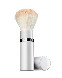The first of its kind. La Mer's sumptuous brush was designed for dual use, loose and pressed powder application. At first extension, it picks up a generous amount of powder for richer coverage. At full extension, it dusts a fine amount of powder onto the skin, creating sheer coverage. The finest natural hairs glide luxuriously over the skin to create a smooth and even, naturally buffed appearance. The first of its kind. La Mer's sumptuous brush was designed for dual use, loose and pressed powder application. At first extension, it picks up a generous amount of powder for richer coverage. At full extension, it dusts a fine amount of powder onto the skin, creating sheer coverage. The finest natural hairs glide luxuriously over the skin to create a smooth and even, naturally buffed appearance.