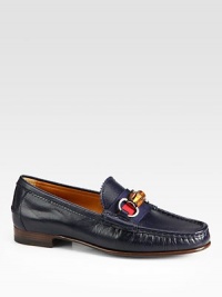 Stitched leather classic with a bamboo buckle and slight heel. Leather upperLeather lining and solePadded insoleMade in Italy Stitched leather classic with a bamboo buckle and slight heel. Leather upperLeather lining and solePadded insoleMade in Italy